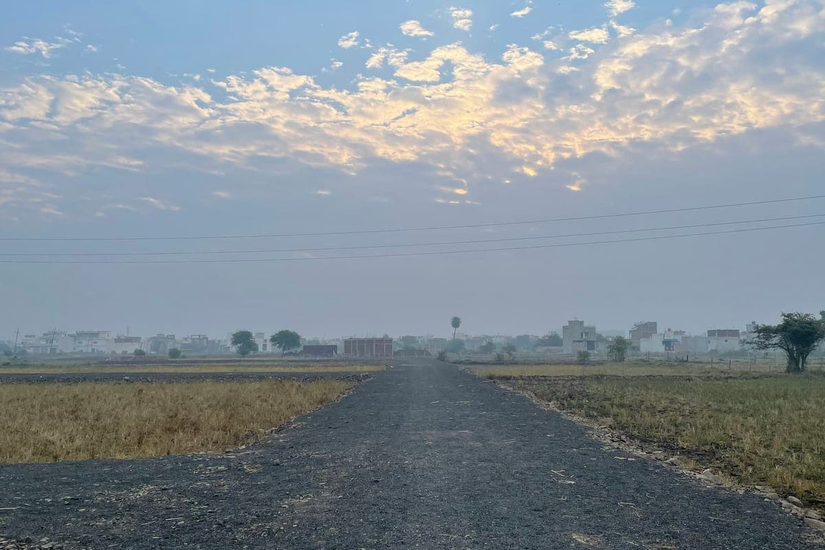 Representative image for Durga Residency: a new road through open land